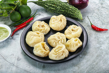 Nepali steamed dumplings  Momo with sause
