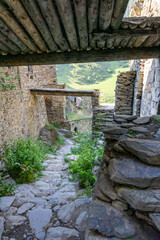 Corridors and streets of the medieval village of Shatili. Wooden floors between walls