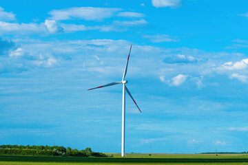 Single wind turbine in beautiful countryside landscape