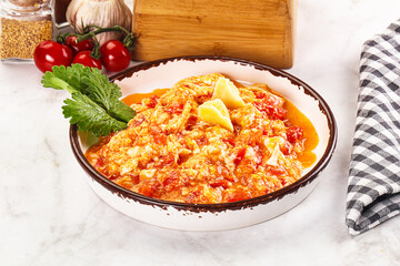 Shakshuka with tomato for breakfast