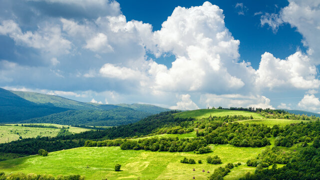 Green mountain landscape with blue sky in summer day