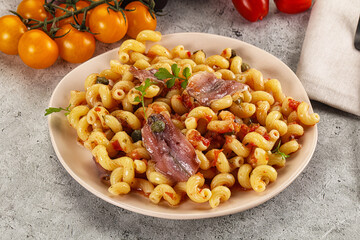 Italian pasta cellentani with anchovy