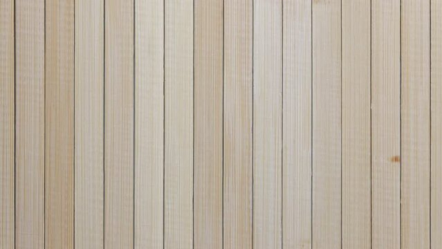 Blank bamboo slips overhead shot horizontally moving material background. Blank bamboo slips.