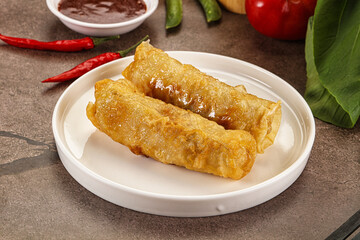 Vietnamese stuffed spring roll served sauce