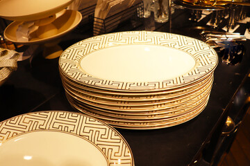 golden plate on a wooden table