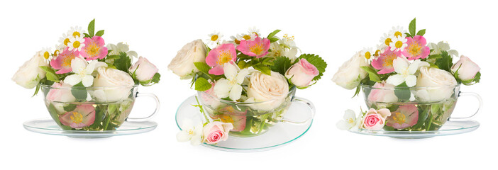 Delicious herbal tea in cups and beautiful flowers on white background, set