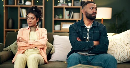 Divorce, fight or couple with arms crossed anger on sofa with conflict, disagreement or cheating in house. Marriage, crisis or frustrated people in living room ignore liar, mistake or commitment fail