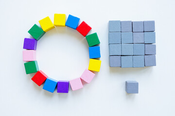 Hierarchy and horizontal structure of the company. Circle of colored cubes and square of gray ones.