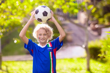 Naklejka premium Italy football fan. Italian kids play soccer.