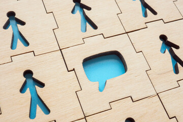 Puzzle of people figures and comment or message for communication or native marketing.