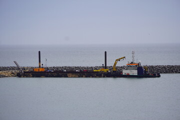 cargo ship in port day light 
