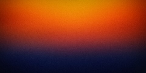 Obraz premium A striking gradient background blending vibrant orange and yellow hues into deep blue, creating a dynamic and visually appealing transition perfect for creative designs and digital projects