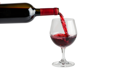 Red wine pouring in glass on white background