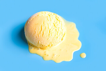 Melting ice cream on blue
