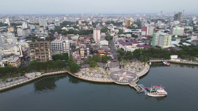 Aerial view of Makassar City landscape from Losari beach area to Central Business District of the city.