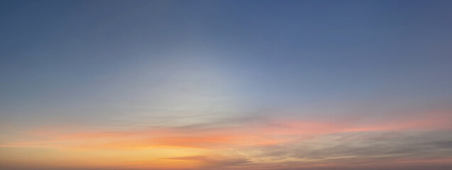 Panorama of beautiful sunset sky, cloud and sun light,  nature weather background