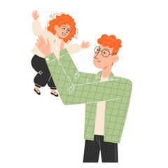 A young father holds his little daughter in his arms