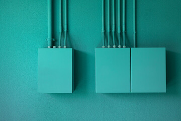 Photo of a blue wall in an electrical room. Industrial background