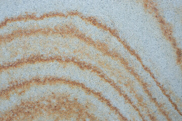 Sand stone with rusty veins like marble texture, close up