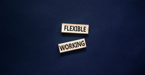 Flexible working symbol. Concept words Flexible working on beautiful wooden block. Beautiful black...
