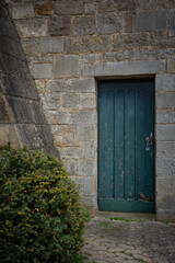 the old door of in stone wall