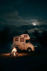 camping car and bonfire