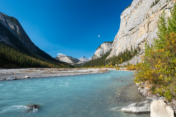 Canadian Rockies Jasper National Park stunning nature scenery. Athabasca River, Rocky mountains in autumn. Alberta, Canada.