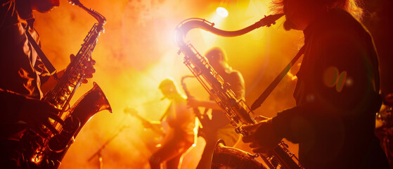 Saxophone players engage in a lively performance under intense, warm stage lighting, creating a powerful and immersive musical experience.