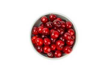 Cherry in a bowl isolated. Fresh ripe cherries with leaves isolated on a white background.Sweet cherries pile. Berries and fruits. Vegan. Healthy eating.
