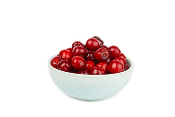 Cherry in a bowl isolated. Fresh ripe cherries with leaves isolated on a white background.Sweet cherries pile. Berries and fruits. Vegan. Healthy eating.