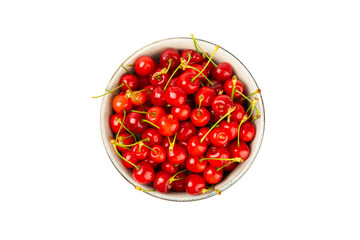 Cherry in a bowl isolated. Fresh ripe cherries with leaves isolated on a white background.Sweet cherries pile. Berries and fruits. Vegan. Healthy eating.