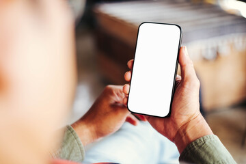 cell phone blank white screen mockup.hand holding texting using mobile on desk at office.background empty space for advertise.work people contact marketing business,technology