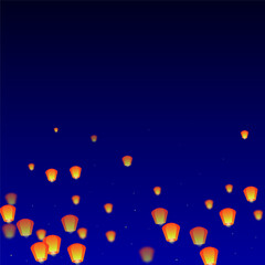 Sky lanterns floating in the night sky.