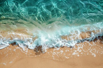 Beach wave approaching shore from elevated viewpoint
