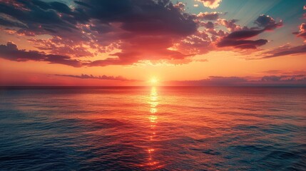 Beautiful sunset over the ocean with colorful skies and calm waters, evoking peace and tranquility