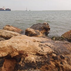 yellow rock in the sea