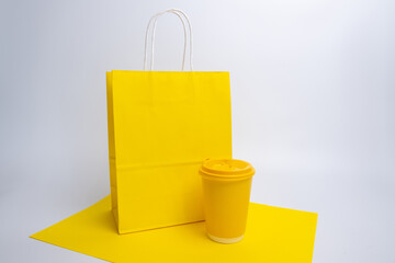 Paper cup and craft bag. A glass for coffee and hot drinks to take with you. Food delivery service....