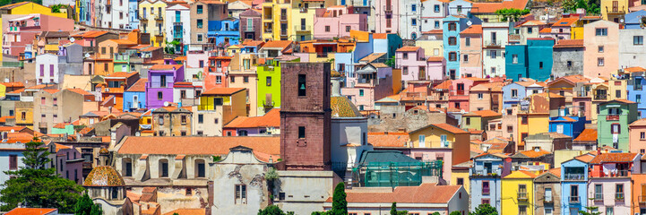Panoramic view of colorful houses in the old town of Bosa, Sardinia island panorama, Italy