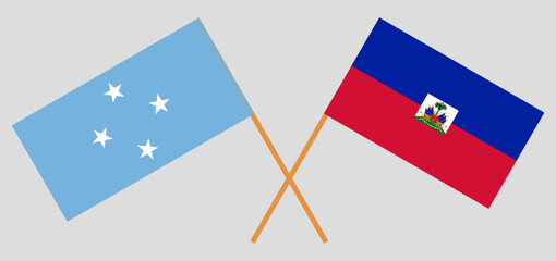 Crossed flags of Micronesia and Haiti. Official colors. Correct proportion