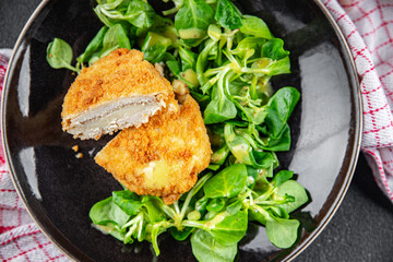 cutlet cordon bleu chicken meat, ham, cheese natural fresh appetizer meal food snack on the table...