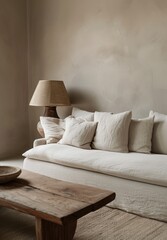 Minimal modern interior with a textured linen sofa and wooden coffee table, featuring an antique bronze lamp with soft light, clay beige color on the wall, serene atmosphere for relaxation