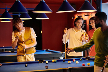 A group of friends enjoy a casual game of billiards in a stylish setting.