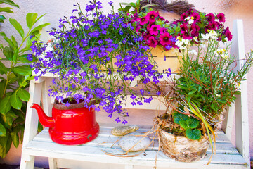 Flowers by the porch, beautiful decoration by the door