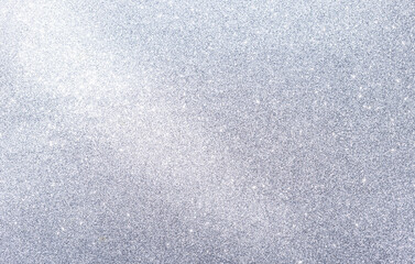 Abstract blurred silver glitter background, blank shiny glitter background, selective focus