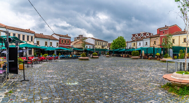 A panorama view across a square in Korca, Albania in summertime