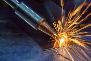 Close up scene the laser welding process by hand held laser welding machine. © Pixel_B