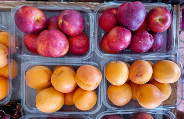 peach appricots fruits on a stall in summer season preveza city greece