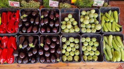 eggplansts pepers, zuccini vegetables fruits on a stall in summer season preveza city greece