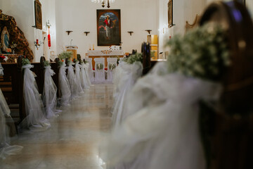 A beautifully adorned church interior, showcasing elegant decorations and a serene ambiance.