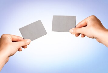 hands holding credit bank cards